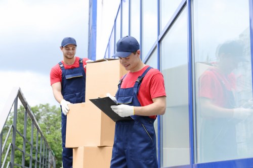 Person organizing boxes in a Finsbury Park storage unit