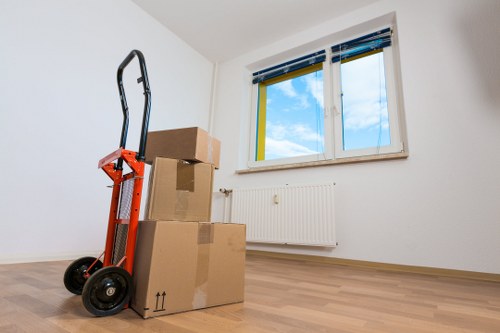 Removal team loading items on a London street in Finsbury Park
